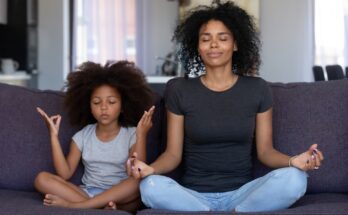 Mindful african mom with funny kid daughter doing yoga together 1126384516 1257x838